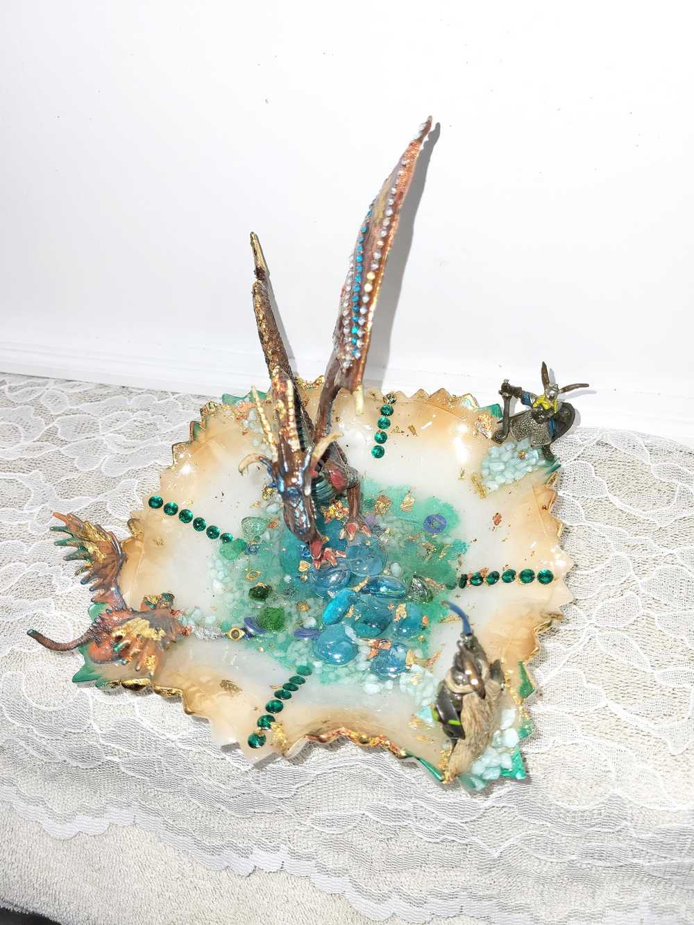 Fire-Breathing Dragon in Antique Glass Dish in a Fierce Fight for Survival