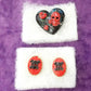 Black Porcelain Heart Shaped Brooch with Red Skull and Heart Charms