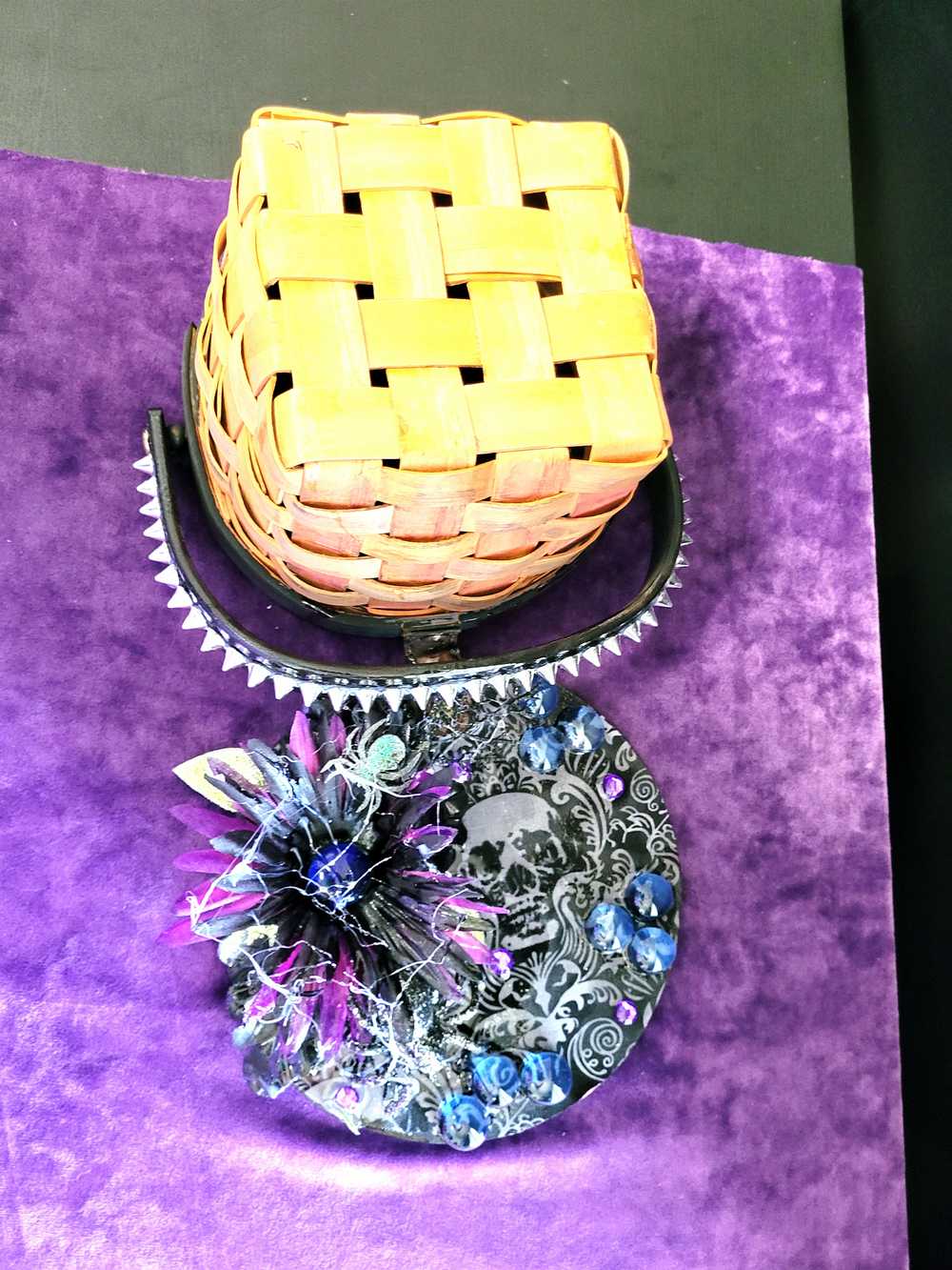 Wood Basket Covered with Black Skull Fabric, with a Purple & Black Flower, Blue Glass Cabochons & a Large Sparkley Spider