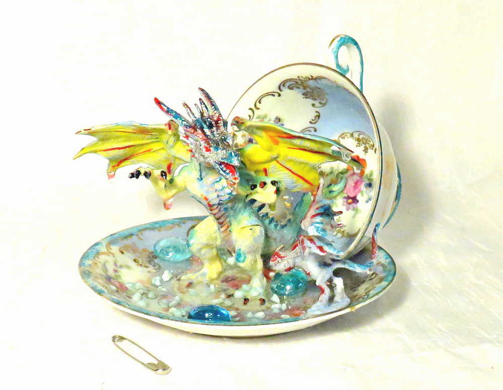 Fighting Dragons in a Vintage Teacup and Saucer Encased in Resin