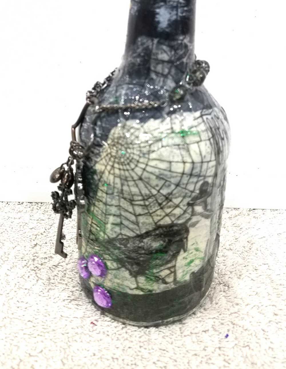 Altered Glass Bottle, Decanter, with a Crow, Chain with Keys, Purple Gems, Re-Usable