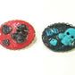 Porcelain Black Oval Shaped Brooch with Hand Painted Teal Skull, Heart & Love Charms