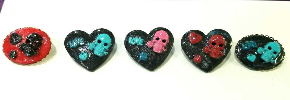 Porcelain Black Oval Shaped Brooch with Hand Painted Teal Skull, Heart & Love Charms