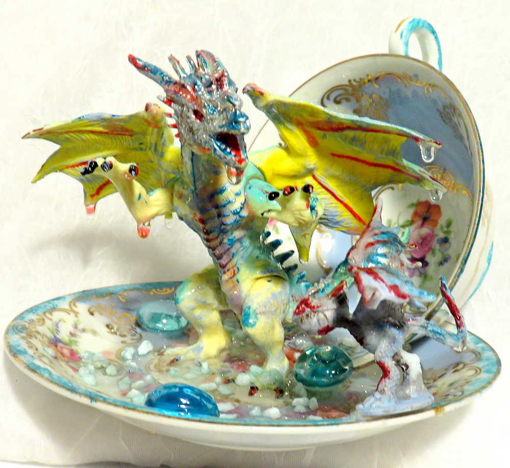 Fighting Dragons in a Vintage Teacup and Saucer Encased in Resin