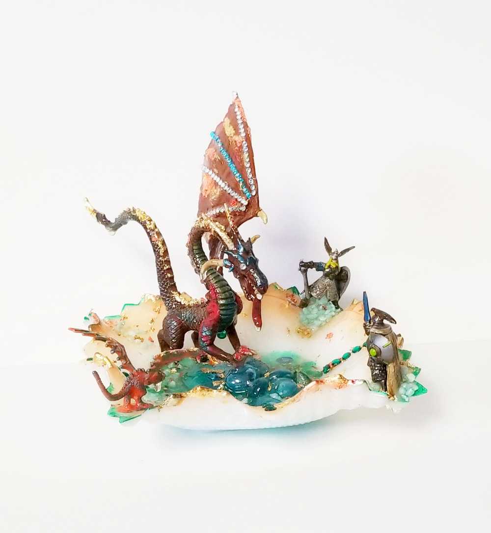 Fire-Breathing Dragon in Antique Glass Dish in a Fierce Fight for Survival