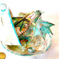 Fighting Dragons in a Vintage Teacup and Saucer Encased in Resin