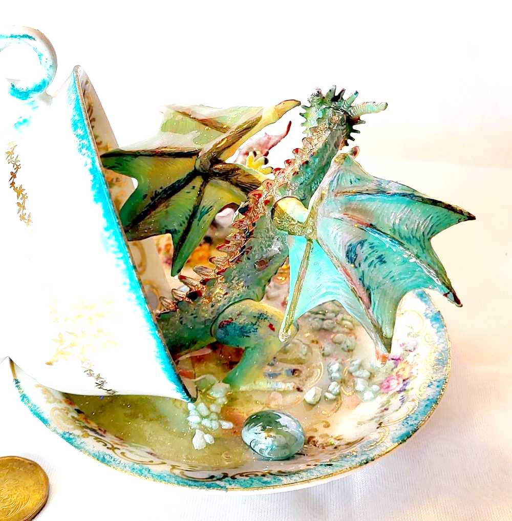 Fighting Dragons in a Vintage Teacup and Saucer Encased in Resin