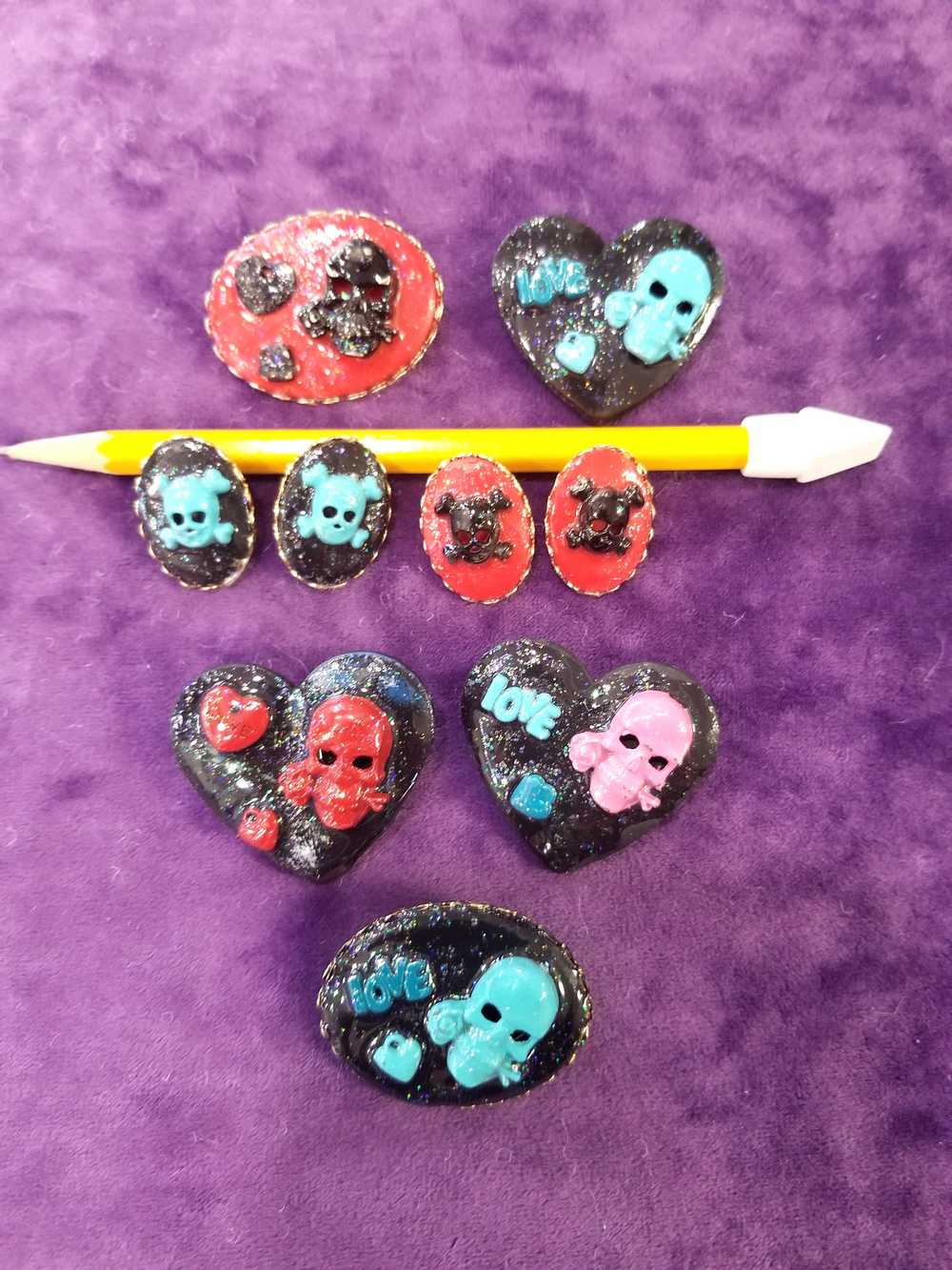 Black Porcelain Heart Shaped Brooch with a Teal Skull, Love and a Heart Charm