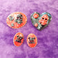 Black Porcelain Heart Shaped Brooch with Red Skull and Heart Charms