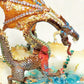 Fire-Breathing Dragon in Antique Glass Dish in a Fierce Fight for Survival