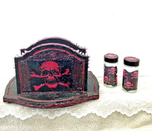 Black & Red Napkin Holder with Salt & Pepper Shakers Decorated with Red Cross & Bones Skull