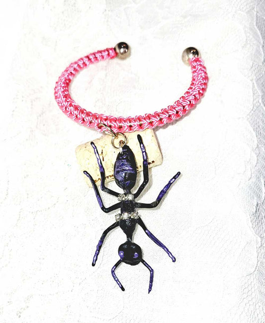 Eerie, Creepy Braided Pink Adjustable Bracelet with an Enormous Black Ant with Hint of Purplle Accents and Clear Rhinestones Across its Back