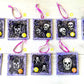 Purple and Black Skull Fabric Faces on Wood Ornaments For your Car, Window, School Locker or Christmas Tree