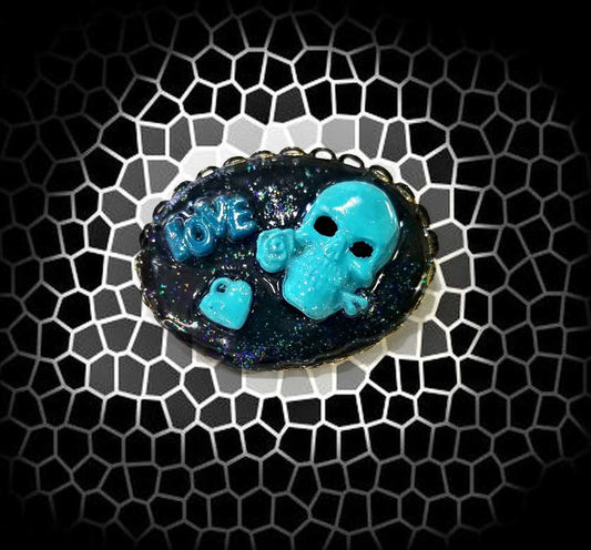 Porcelain Black Oval Shaped Brooch with Hand Painted Teal Skull, Heart & Love Charms