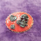 Stunning Red Porcelain Oval Brooch with Hand Painted Black Skull and Hearts