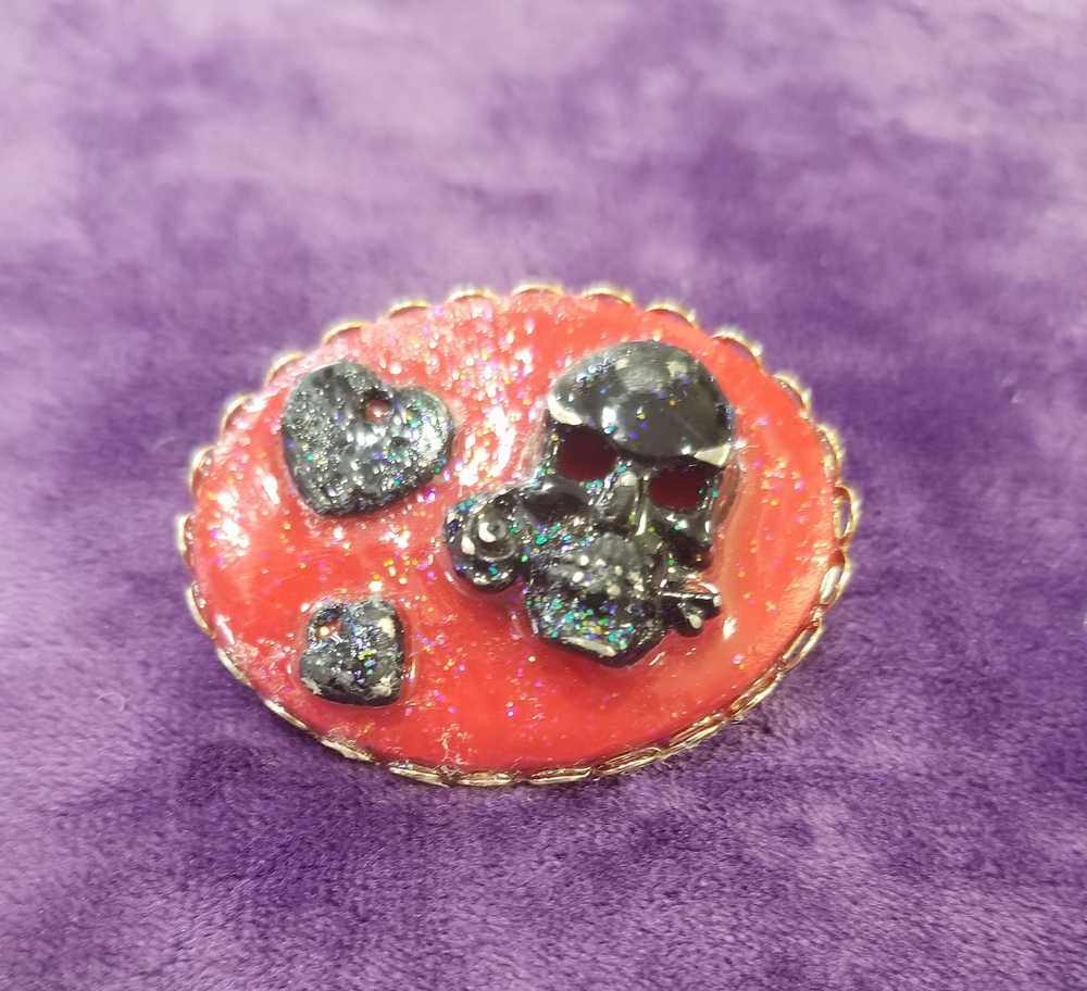 Stunning Red Porcelain Oval Brooch with Hand Painted Black Skull and Hearts