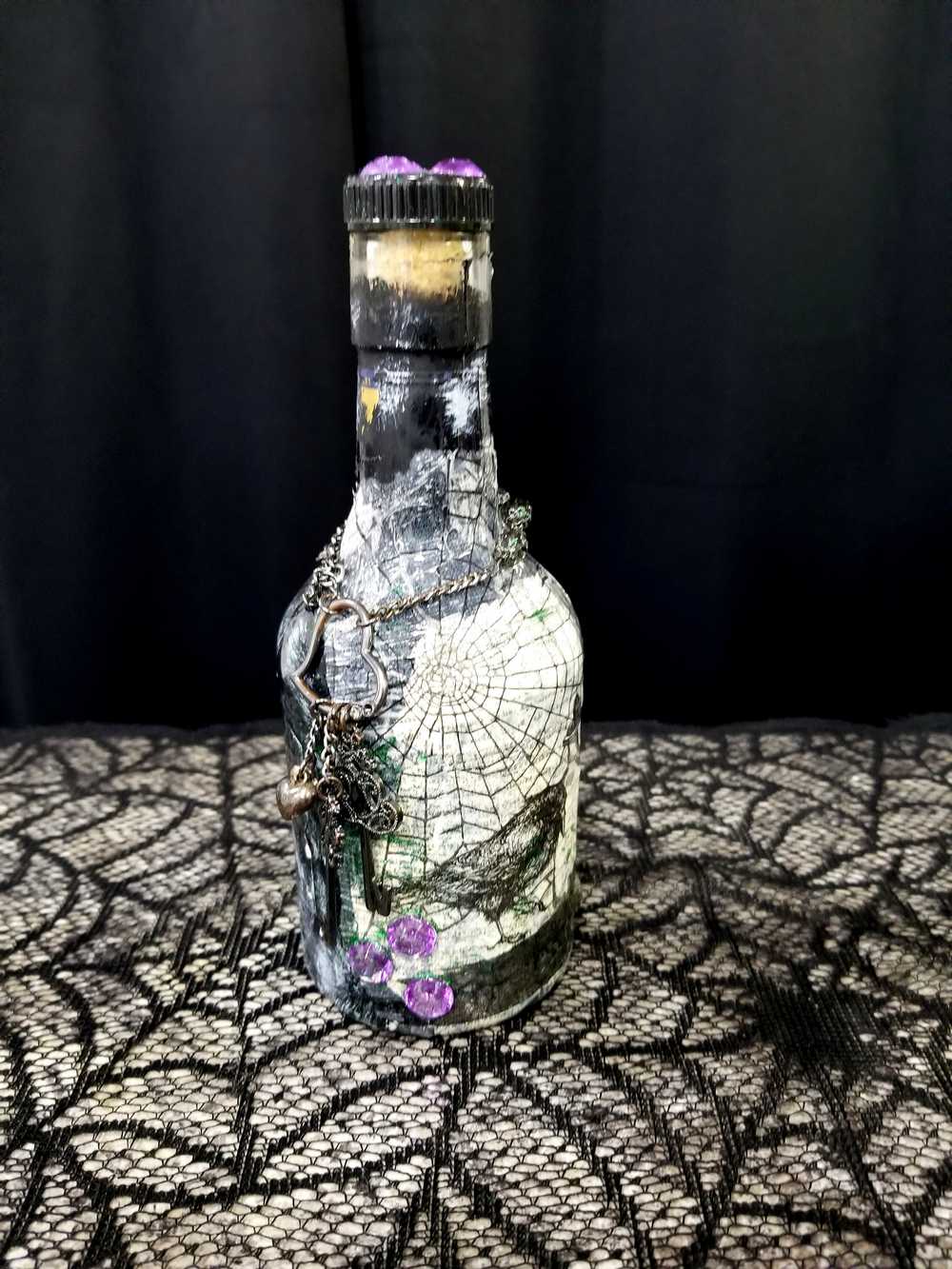 Altered Glass Bottle, Decanter, with a Crow, Chain with Keys, Purple Gems, Re-Usable