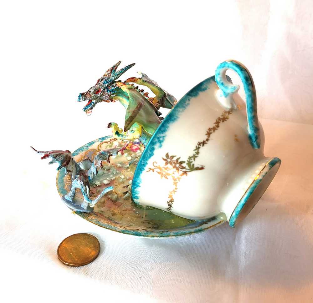 Fighting Dragons in a Vintage Teacup and Saucer Encased in Resin