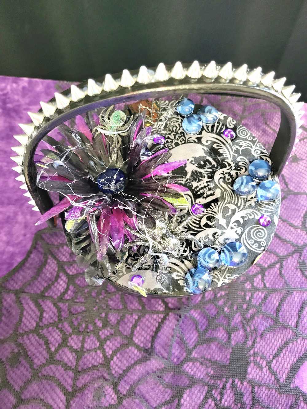 Wood Basket Covered with Black Skull Fabric, with a Purple & Black Flower, Blue Glass Cabochons & a Large Sparkley Spider