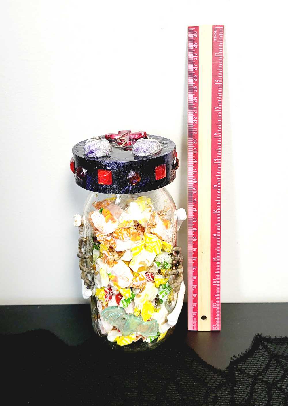 1 litre Mason Jar Filled with Hard Candy. With a Wooden Lid with Resin Skulls & a Cross