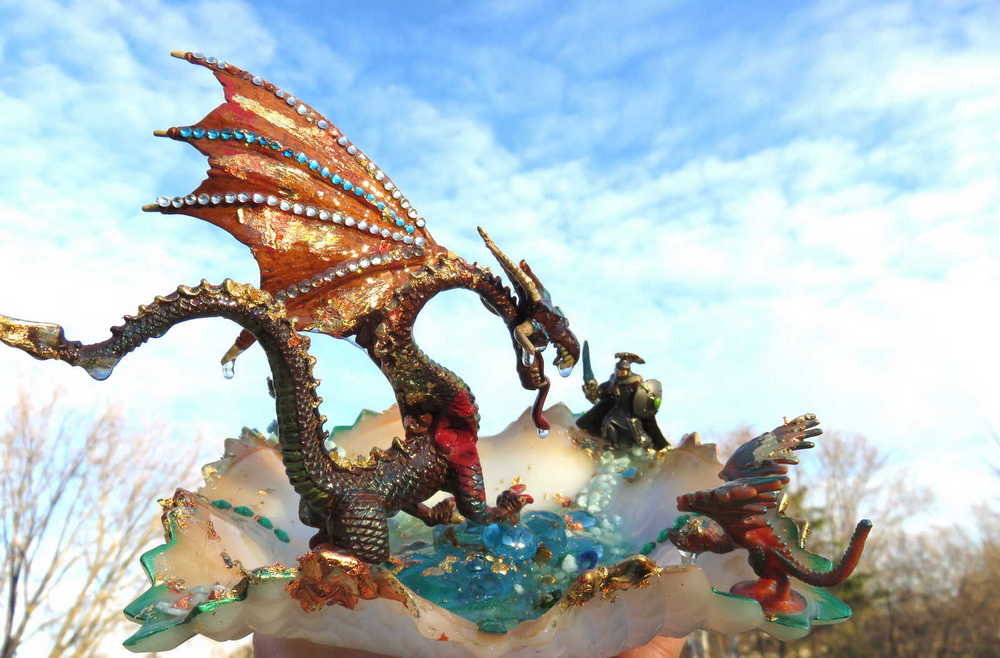 Fire-Breathing Dragon in Antique Glass Dish in a Fierce Fight for Survival