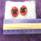 Red Porcelain Pierced Earrings with Black Skull & Bones