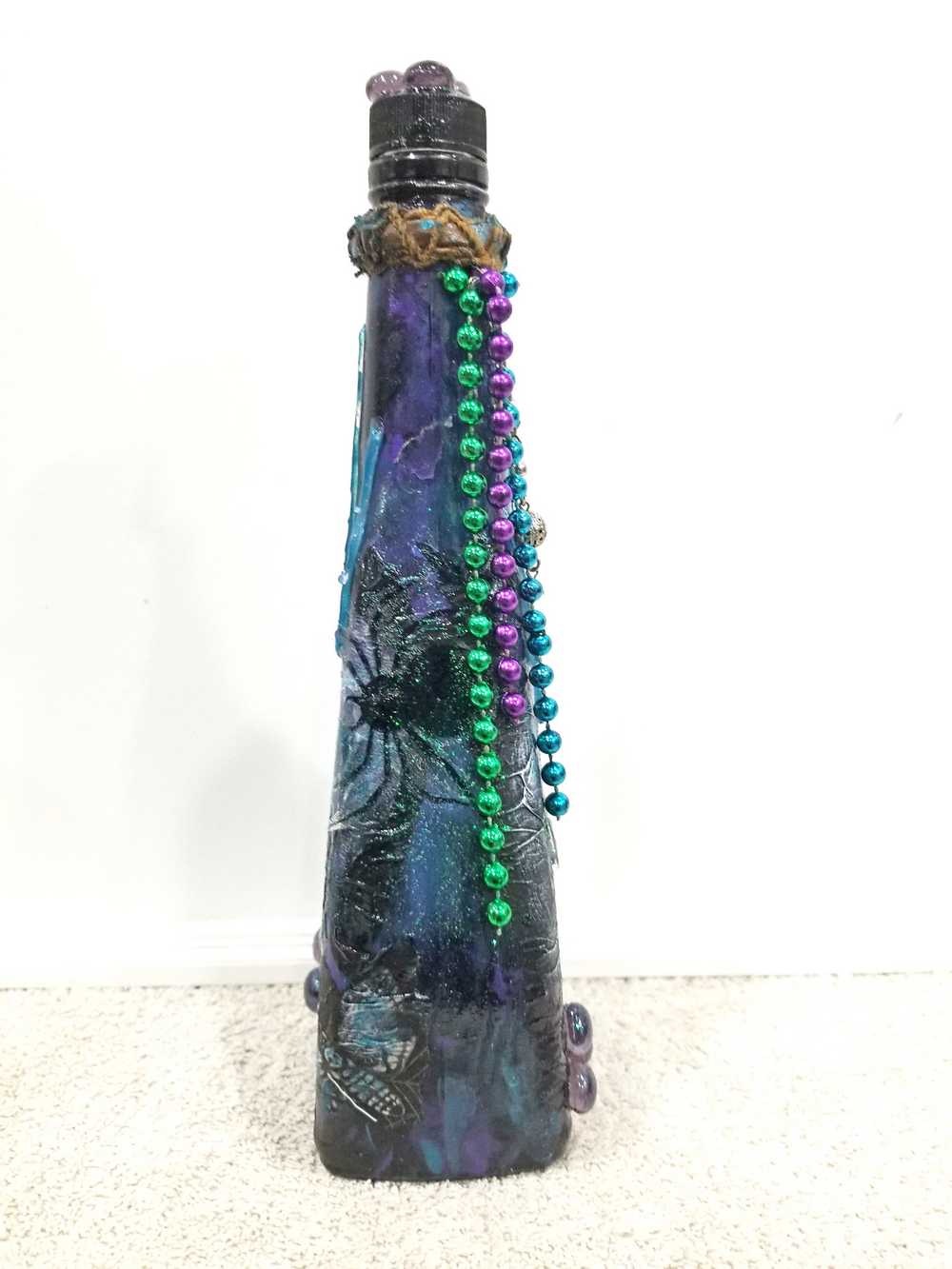 Altered Refillable Glass Bottle, Decoupage Skull Art with Multi Beads and Glass Gems