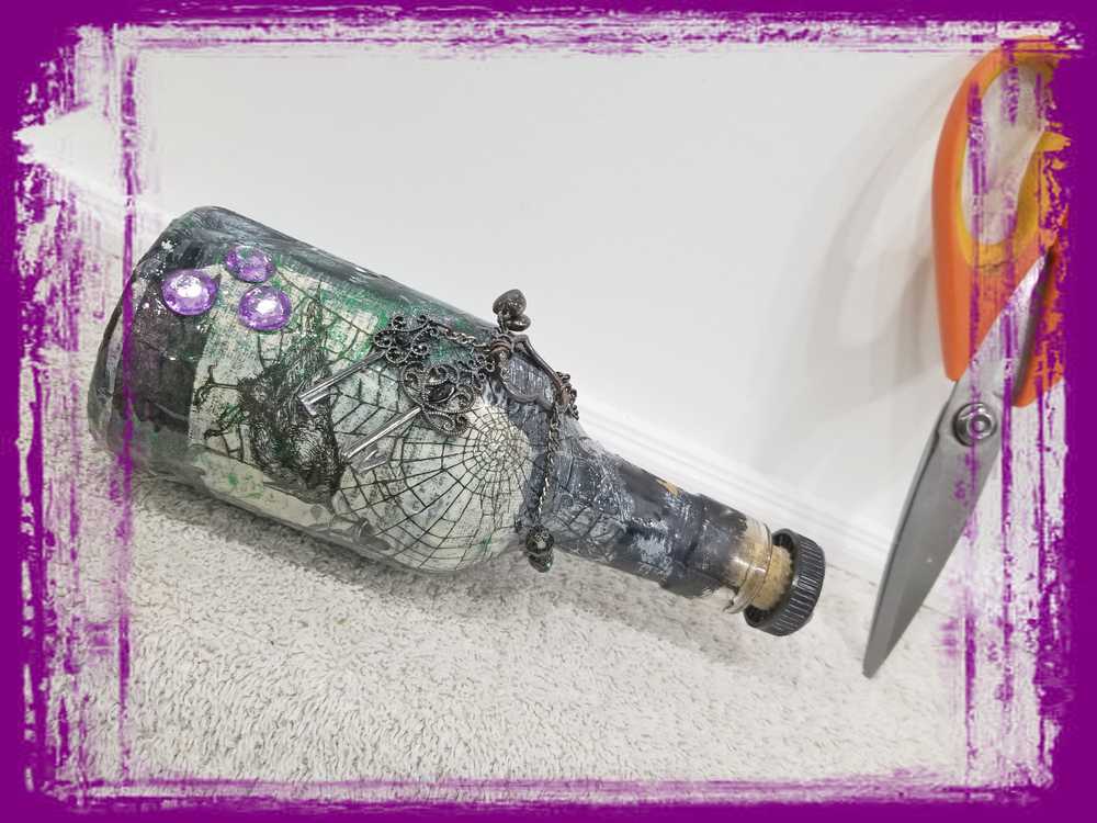 Altered Glass Bottle, Decanter, with a Crow, Chain with Keys, Purple Gems, Re-Usable