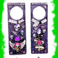 "Stay Out" Door Knob Signs with Skulls, a Dagger, a Rose and a Heart in Black & Purple