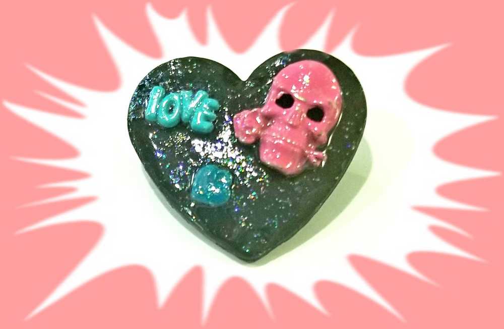 Black Porcelain Heart Shaped Brooch with a Pink Skull and a Teal Heart & Love Charm