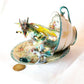 Fighting Dragons in a Vintage Teacup and Saucer Encased in Resin