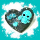 Black Porcelain Heart Shaped Brooch with a Teal Skull, Love and a Heart Charm