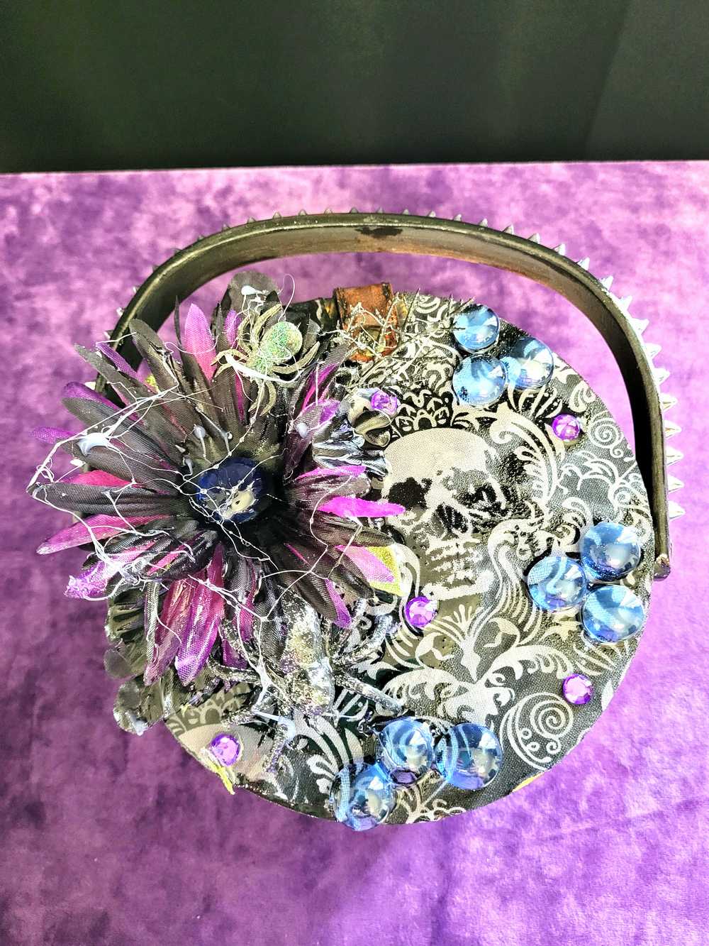 Wood Basket Covered with Black Skull Fabric, with a Purple & Black Flower, Blue Glass Cabochons & a Large Sparkley Spider