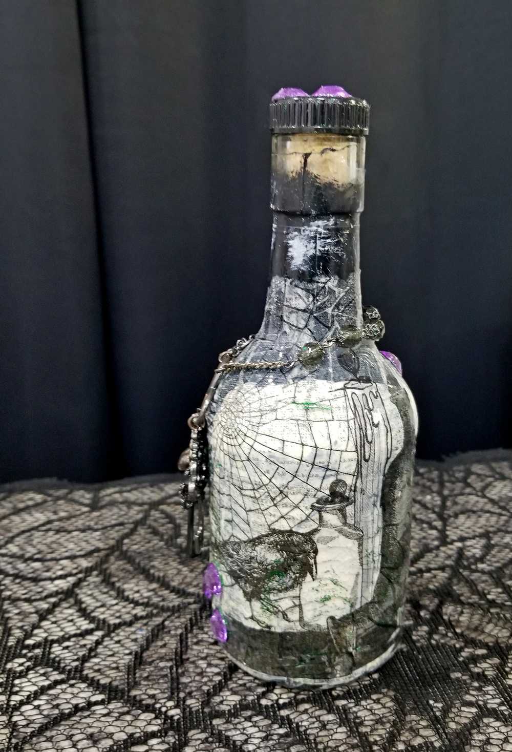 Altered Glass Bottle, Decanter, with a Crow, Chain with Keys, Purple Gems, Re-Usable