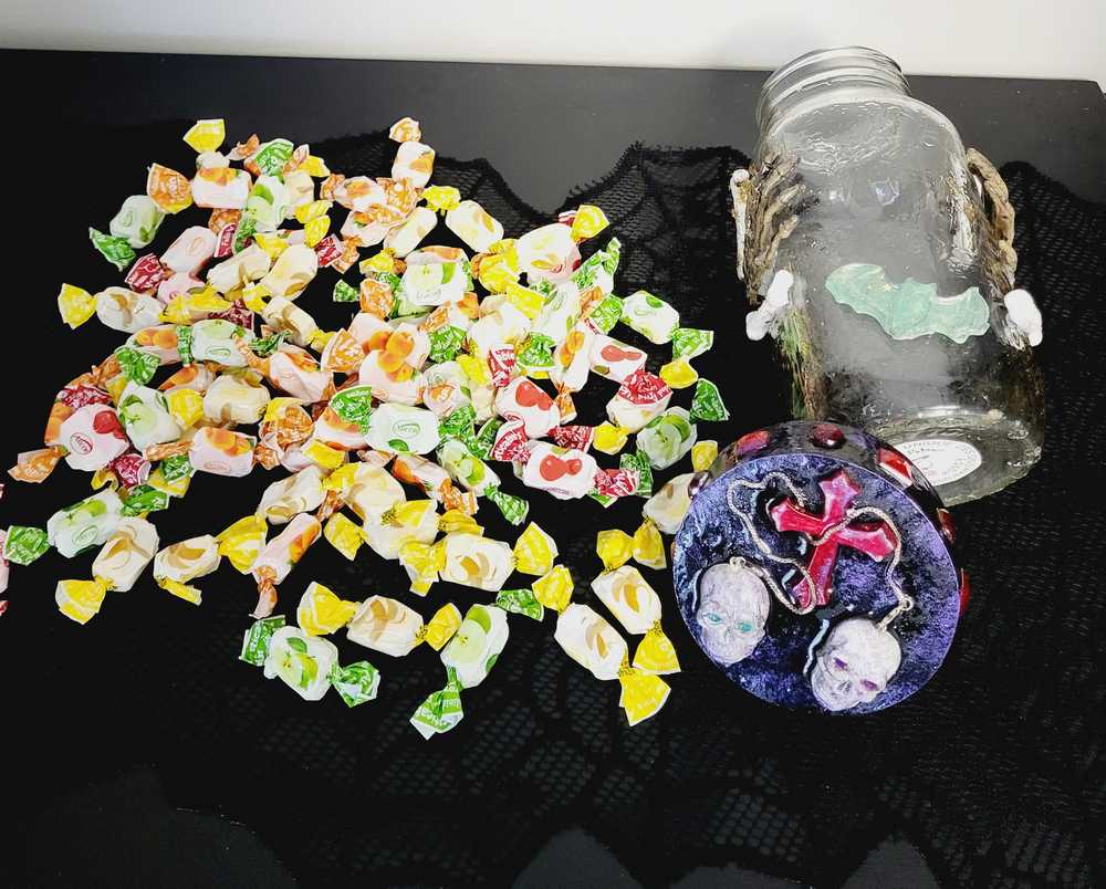 1 litre Mason Jar Filled with Hard Candy. With a Wooden Lid with Resin Skulls & a Cross