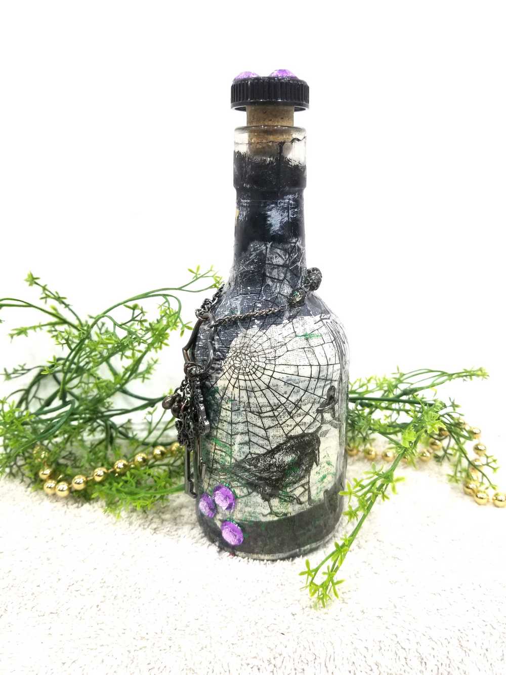 Altered Glass Bottle, Decanter, with a Crow, Chain with Keys, Purple Gems, Re-Usable