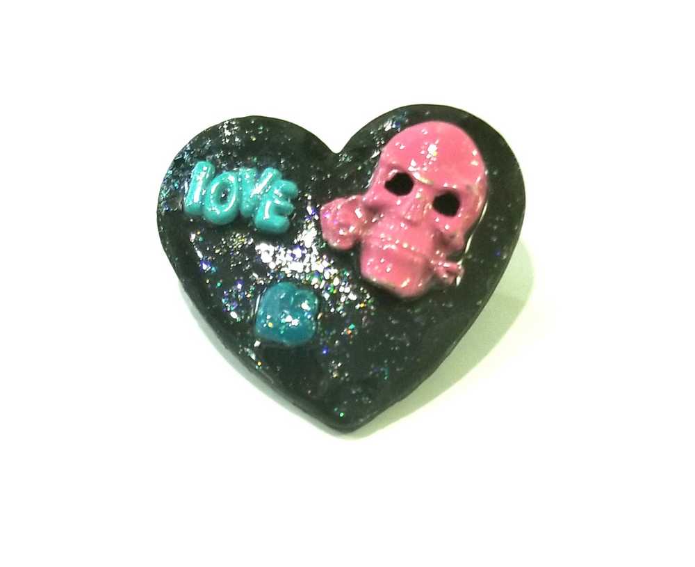 Black Porcelain Heart Shaped Brooch with a Pink Skull and a Teal Heart & Love Charm