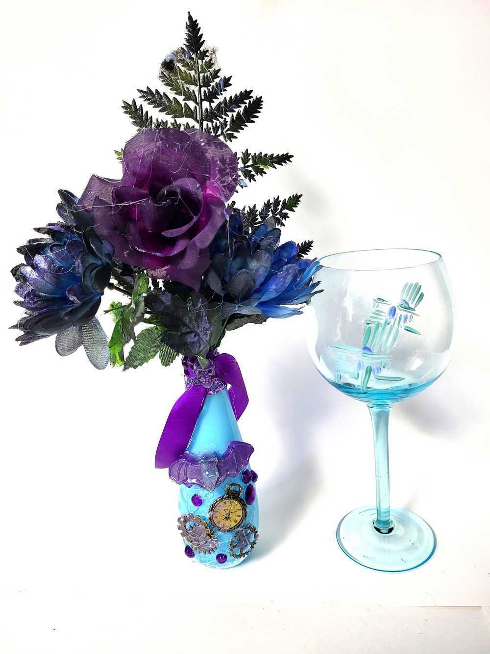 Teal Glass Vase with Skull, Purple Rose and Gears