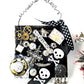 Skull & Bones Wall Plaque in Black & Gold, with Curly Wire Ribbon "No Regrets"