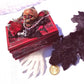 Small Red and Black Jewelry Box with a Skull and a Red Rose