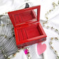 Small Red and Black Jewelry Box with a Skull and a Red Rose