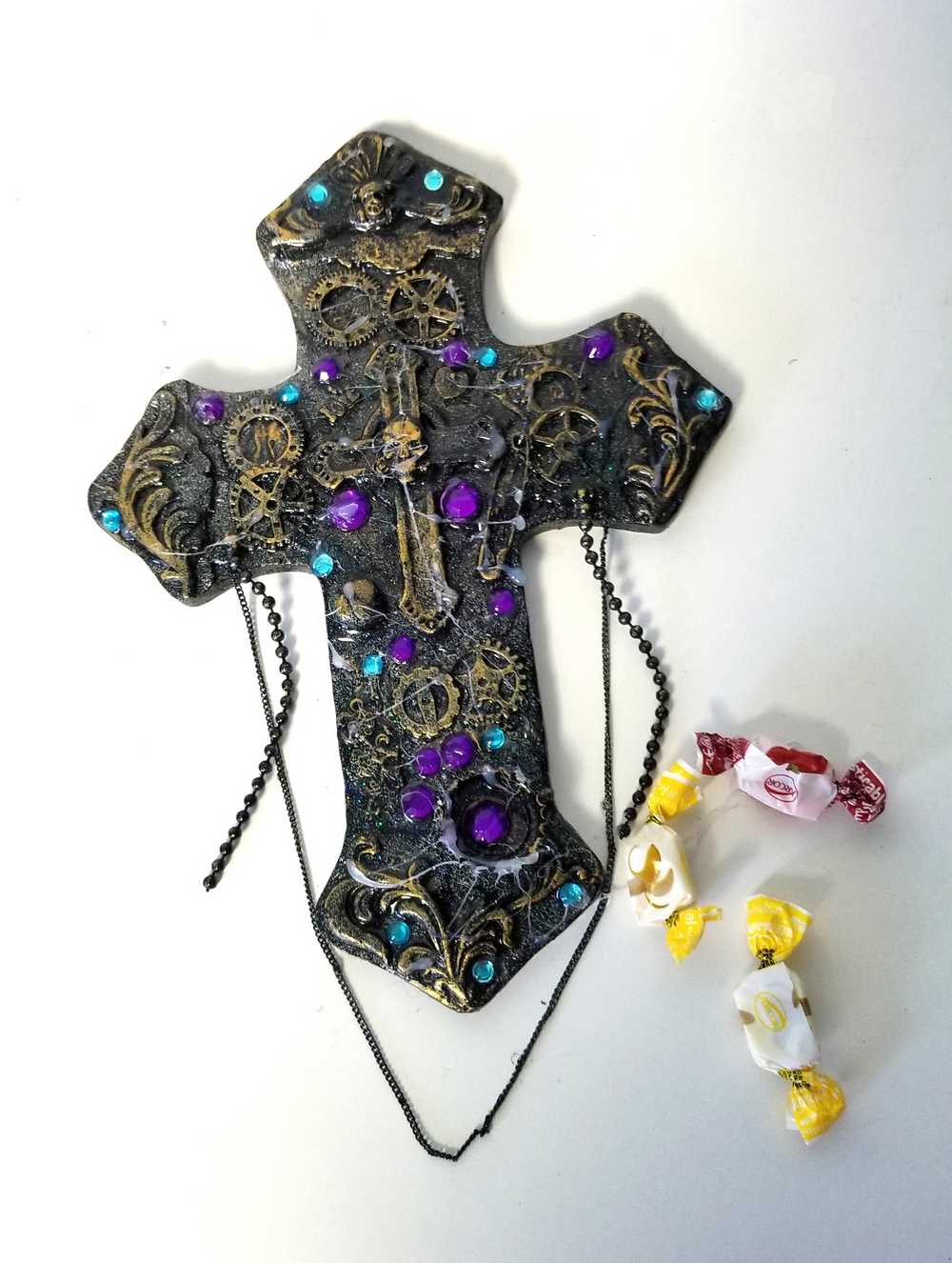 Altered Cross Made of Plaster with Skulls, Gears and Chains