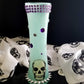 19 cm Tall Teal Colored Glass Vase with Skulls, Spikes and Resin