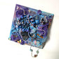 Bottle Openers as an Art Piece with Skull, Flowers, Buttons and So Much More