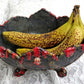 Altered Black Glass Bowl with Pedestal Feet and Scalloped Edge
