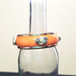 Orange Bangle, Bracelet with 4 Skulls