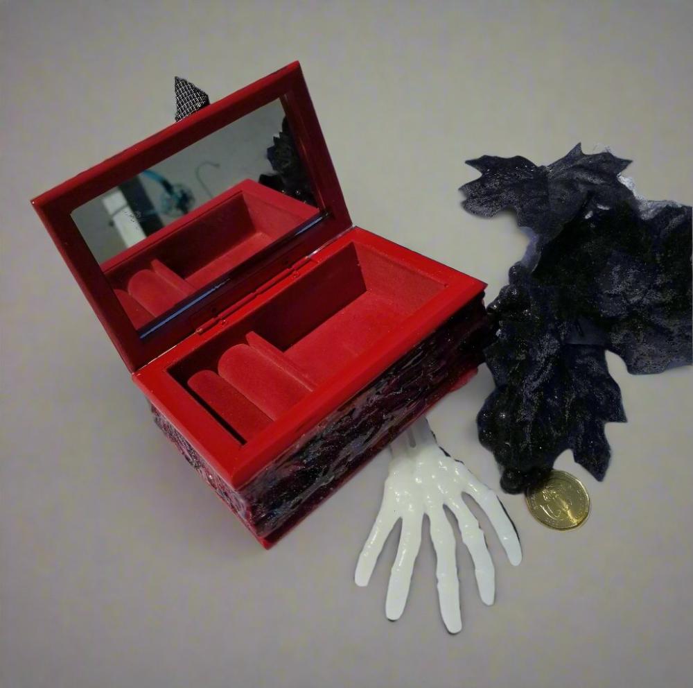 Small Red and Black Jewelry Box with a Skull and a Red Rose