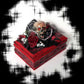 Small Red and Black Jewelry Box with a Skull and a Red Rose