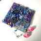 Bottle Openers as an Art Piece with Skull, Flowers, Buttons and So Much More