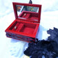 Small Red and Black Jewelry Box with a Skull and a Red Rose